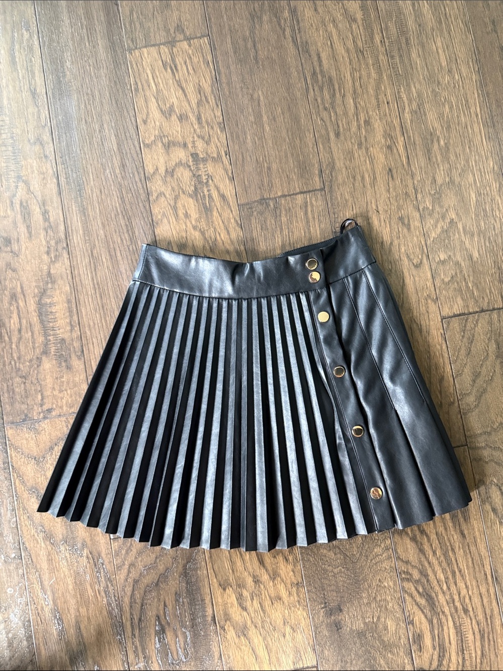 DO+BE Black Pleated Faux Leather Mini Skirt with Gold snaps